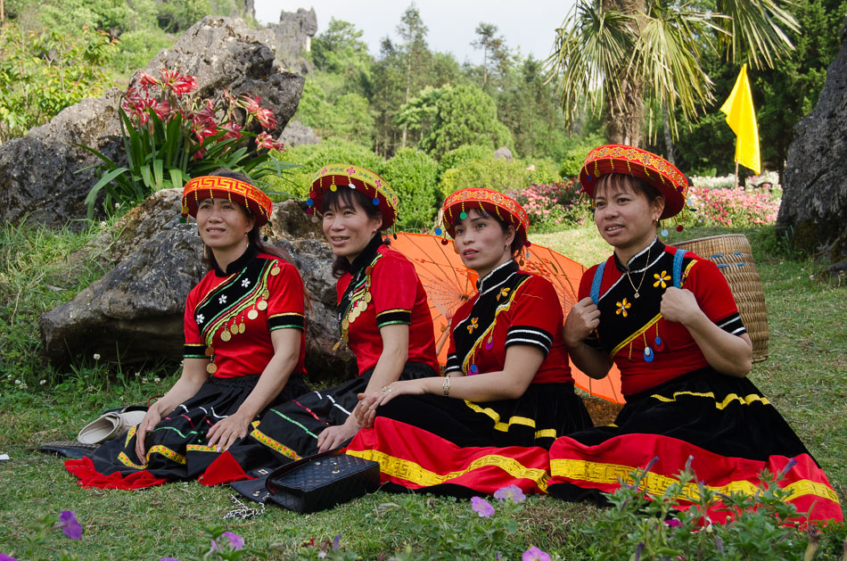 4 women in traditional costumes